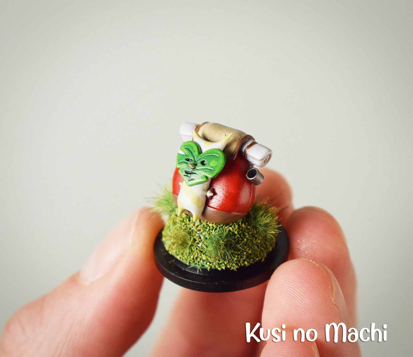 Mini Cloche Korogu au sac à dos.