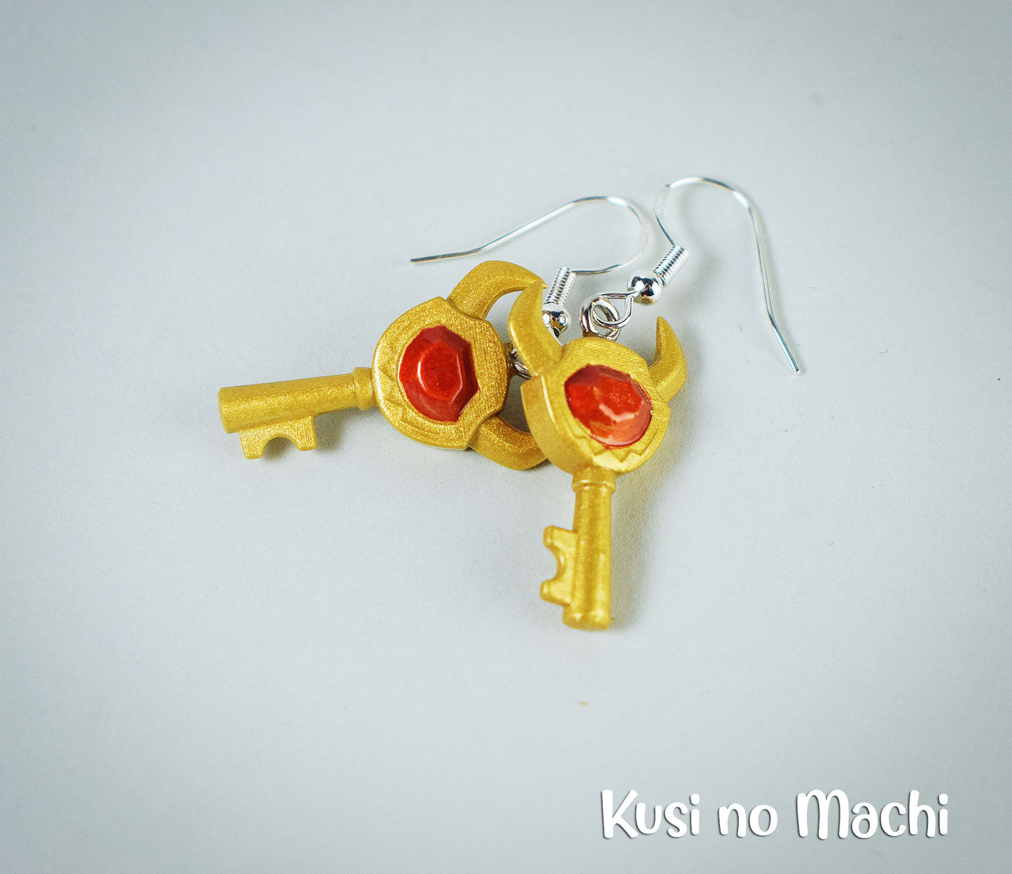 Boucle d'oreille Clé de Boss