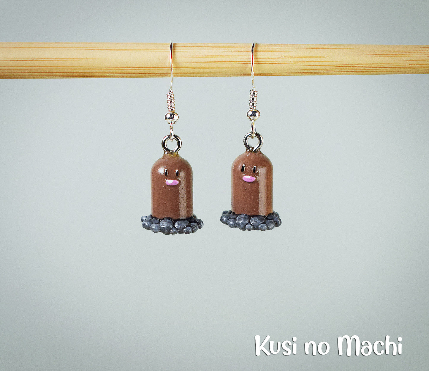 Boucle d'oreille Taupiqueur
